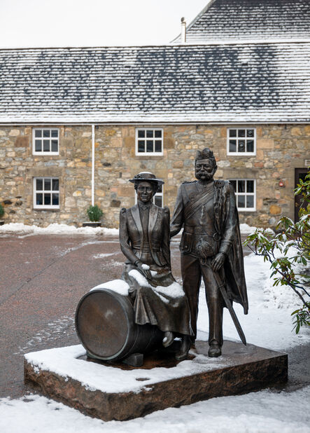 Statue of William Grant and his wife, Elizabeth, outside his first distillery, Glenfiddich